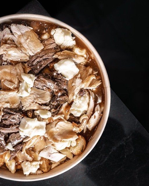 Amir food photography showing a fresh salad bowl.